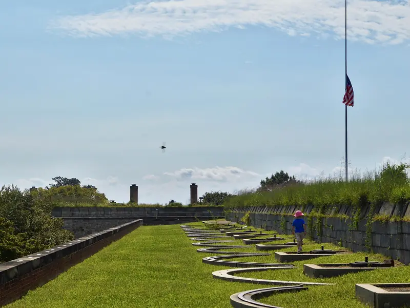 The grass ramparts and flag at Fort Monroe in Hampton