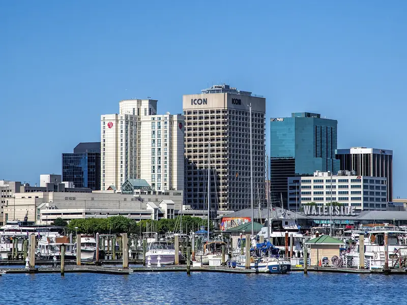 Downtown Norfolk seen from the water, with boats at the marina