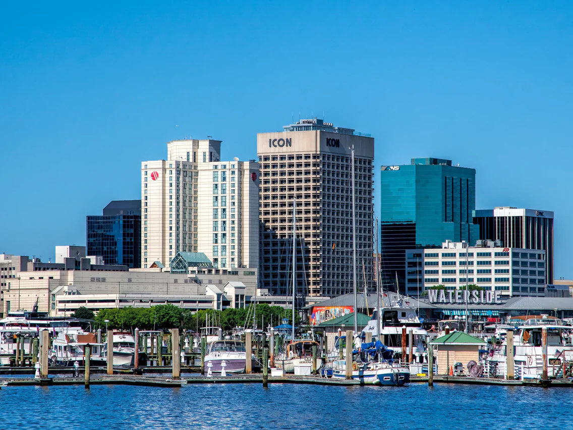 Downtown Norfolk seen from the water, with boats at the marina