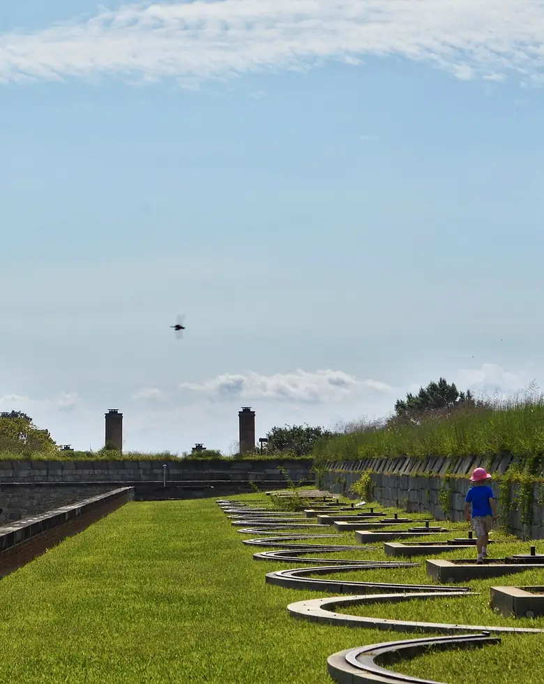 The grass ramparts and flag at Fort Monroe in Hampton