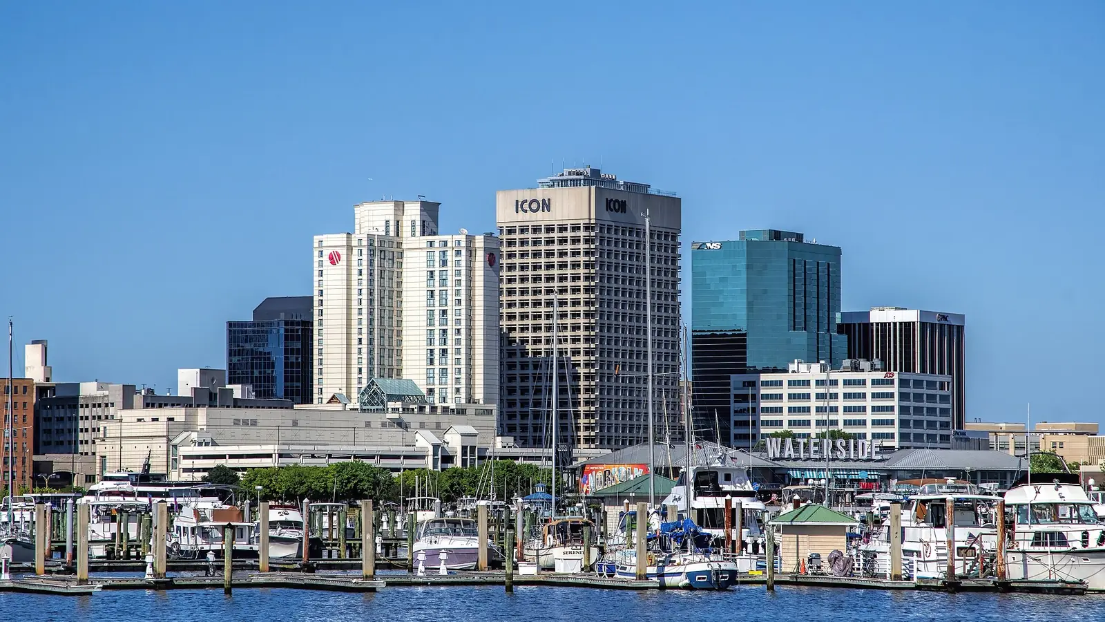 Downtown Norfolk seen from the water, with boats at the marina