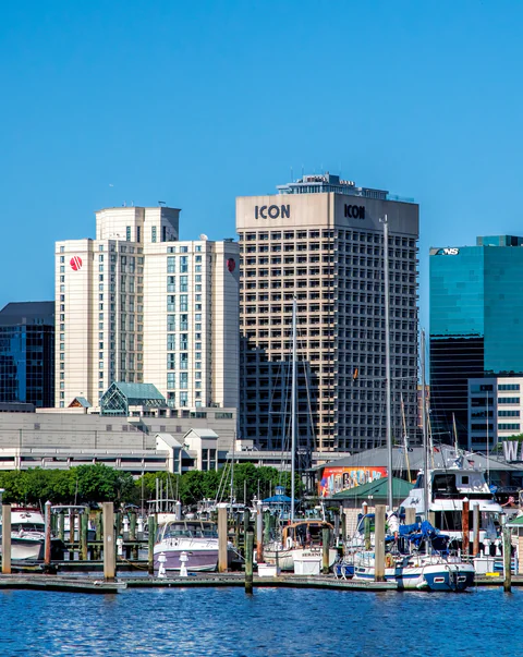Downtown Norfolk seen from the water, with boats at the marina