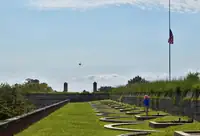 The grass ramparts and flag at Fort Monroe in Hampton