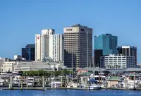 Downtown Norfolk seen from the water, with boats at the marina