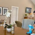 E3R team member cleaning a dining room